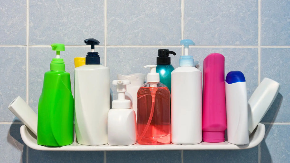 Plastic bottles on bathroom shelf
