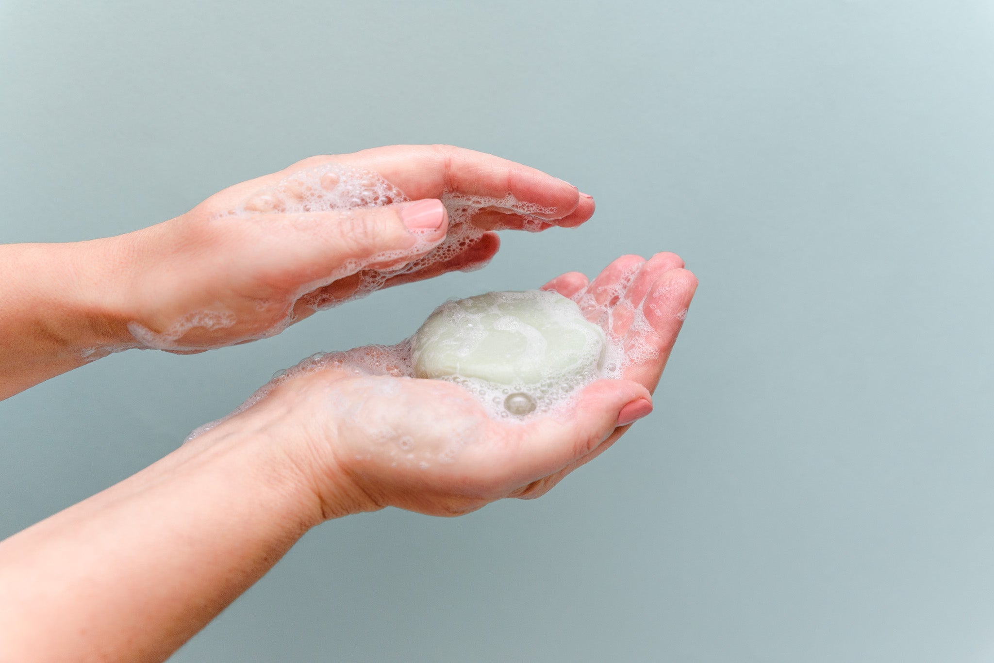 solid shampoo lather in hands