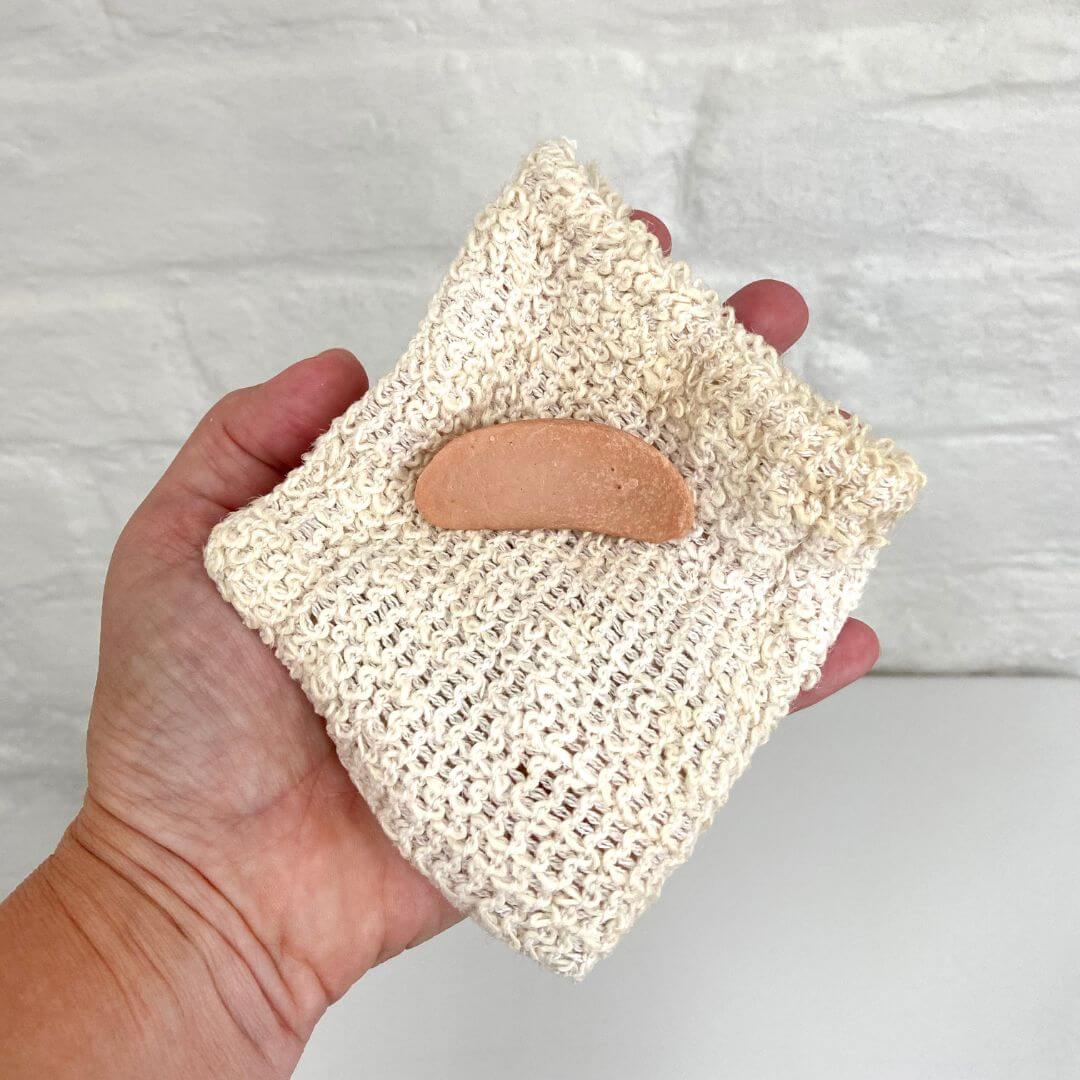 Sisal soup pouch for storing shampoo bar with hand